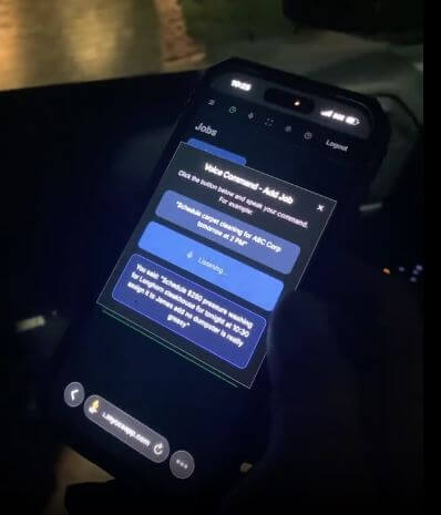 Technician using MyCCSApp's AI Voice hands free scheduler to schedule pressure washing job for a commercial steakhouse restaurant